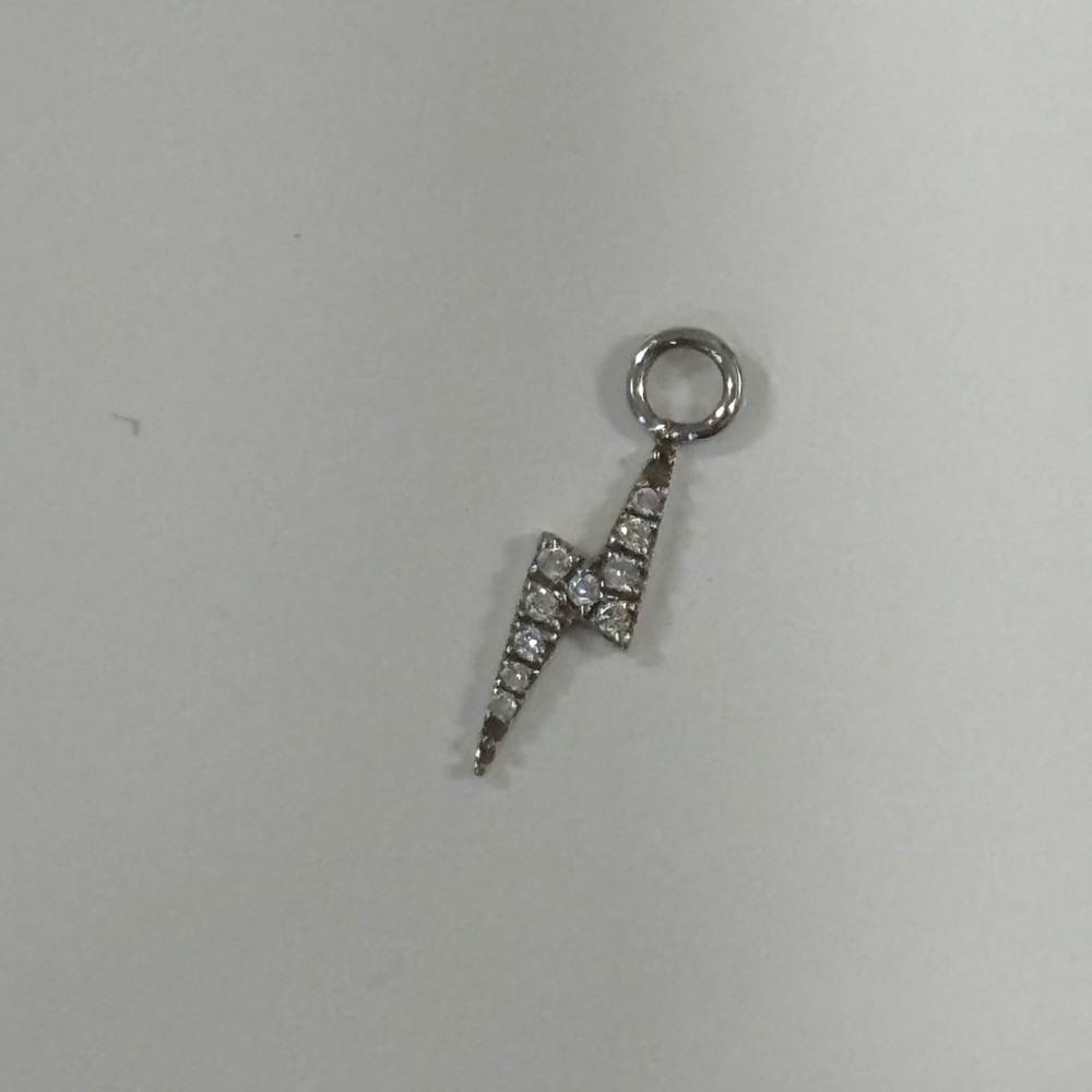 Maria Tash white gold and diamond lightning bolt charm.
